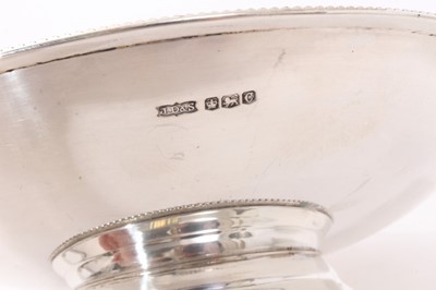 Lot 280 - 1940s silver dish of circular form with bead border, on a domed circular foot (Sheffield 1945) James Dixon & Son. All at approximately 12ozs. 20.5cm diameter.