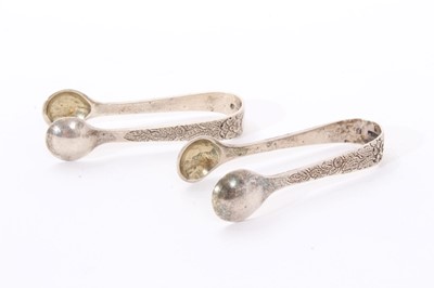 Lot 296 - A pair of Victorian Scottish silver miniature tongs