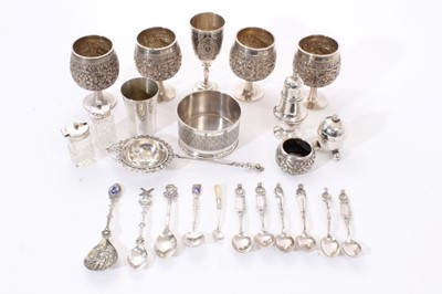 Lot 282 - Selection of miscellaneous silver and white metal, including set of four Eastern goblets, various condiments, continental silver spoons, tea strainer and other items (Various dates and makers) (qty...