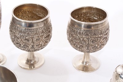 Lot 282 - Selection of miscellaneous silver and white metal, including set of four Eastern goblets, various condiments, continental silver spoons, tea strainer and other items (Various dates and makers) (qty...