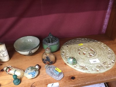 Lot 141 - Chinese carved and pierced hardstone Bi disc, three Chinese greenstone bowls, Chinese snuff bottles and similar