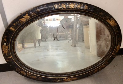 Lot 1370 - 1920s black lacquer oval wall mirror with chinoiserie decoration