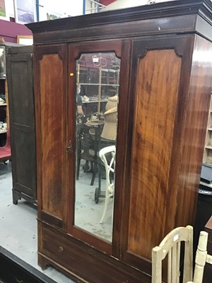 Lot 23 - Edwardian walnut wardrobe with mirrored glass door