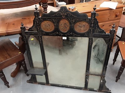 Lot 899 - Edwardian ebonised mirror with painted floral panels