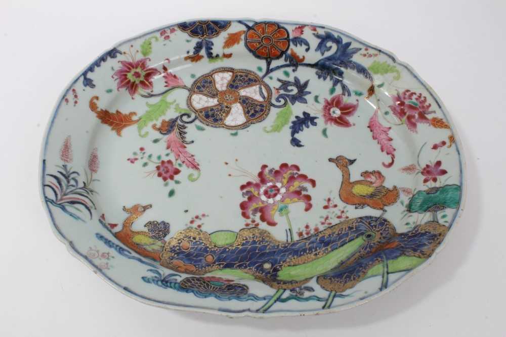 Lot 40 - 18th century Chinese tobacco leaf porcelain platter, finely decorated in famille rose enamels and underglaze blue, 40.5cm across