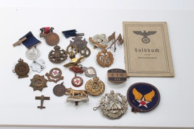 Lot 645 - Second World War Nazi passbook together with a group of military badges