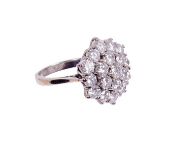 Lot 428 - Diamond cluster ring with a large cluster of 19 brilliant cut diamonds in tiered claw setting on 18ct white gold shank. Estimated total diamond weight approximately 3.80cts.