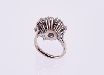 Lot 428 - Diamond cluster ring with a large cluster of 19 brilliant cut diamonds in tiered claw setting on 18ct white gold shank. Estimated total diamond weight approximately 3.80cts.