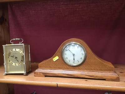 Lot 134 - 1930s Golden Oak mantel clock by JW Benson together with another modern quartz mantel clock (2)