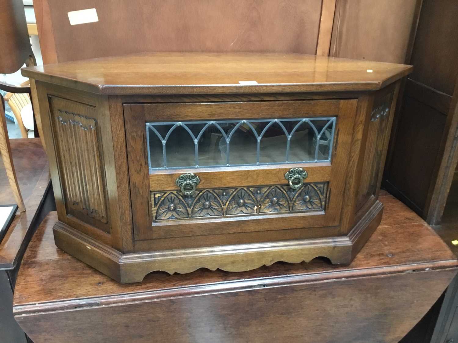 Lot 862 - Old Charm oak television stand,  and two oak cupboards (3)