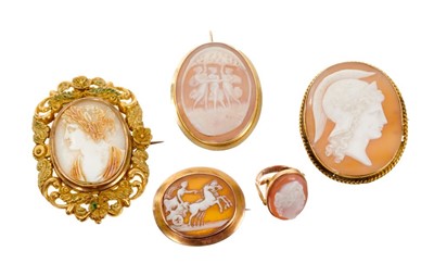 Lot 425 - Four antique carved shell cameo brooches and a ring