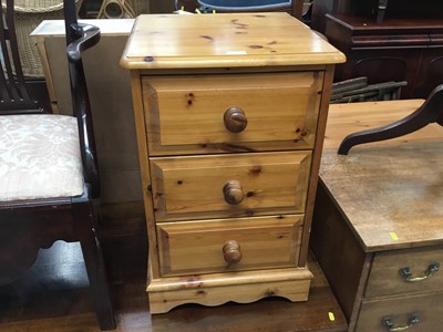 Lot 873 - Pine narrow three drawer chest and four drawer pine chest, two pine stools and loom chair