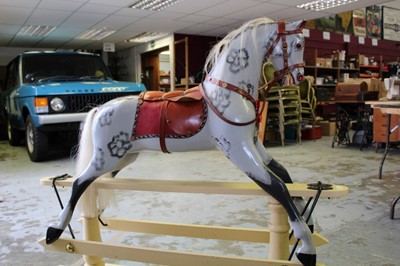 Lot 1558 - Good quality children's rocking horse on cantilever base