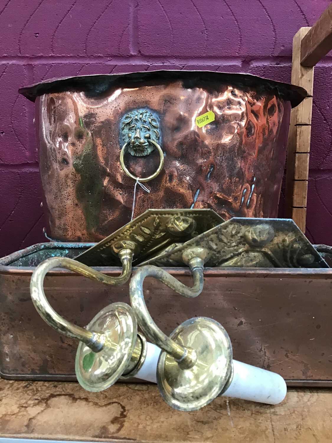 Lot 544 - Copper lion handle log bucket, copper plant trough and pair of brass single scone wall lights