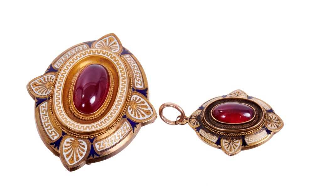 Lot 414 - Victorian Etruscan revival gold enamel and cabochon garnet pendant brooch, the central oval cabochon garnet surrounded by a beaded gold border, Greek key and classical motifs in blue and white cham...