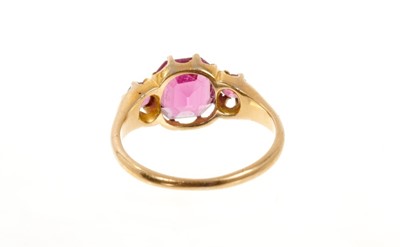 Lot 413 - Victorian garnet three stone ring in gold claw setting, ring size K.