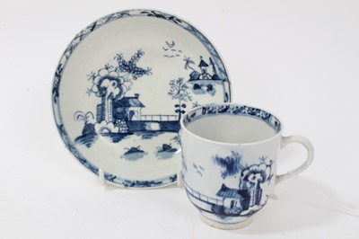 Lot 56 - 18th century Lowestoft blue and white porcelain cup and saucer, c. 1775, decorated with chinoiserie pattern, painter's mark inside footrim of cup