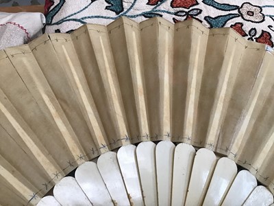 Lot 1834 - 18th century fan with finely carved ivory struts in an 18th century floral printed card case,  and other  antique fans