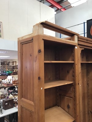 Lot 1016 - Narrow pine bookcase with cupboard below