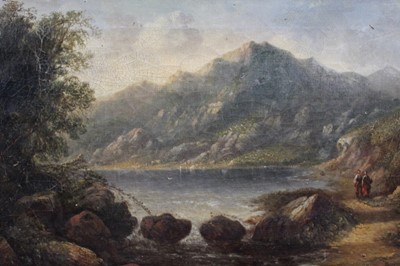 Lot 1020 - English School mid 19th Century, oil on canvas – A mountainous river landscape with figures on a track, Thomas Agnew & Son label verso, in original gilt frame, 29cm x 45cm