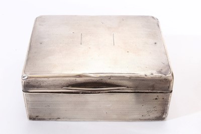 Lot 303 - Three early 20th century cigarette cases, a book match cover, a small cigarette box and a long rectangular cigarette case silver frame (Various dates and makers) 22ozs weighable silver. (6)