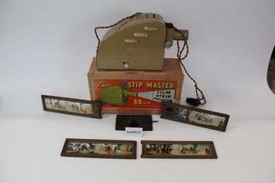 Lot 1513 - Victorian magic lantern slides, vintage Disney film strips and a vintage 35mm film strip projector