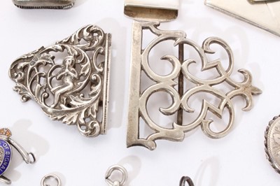 Lot 305 - Selection of miscellaneous silver bijouterie including vesta, money clip, stamp holder, locket, various badges and other items (Various dates and makers) all at approximately 6ozs. (qty)