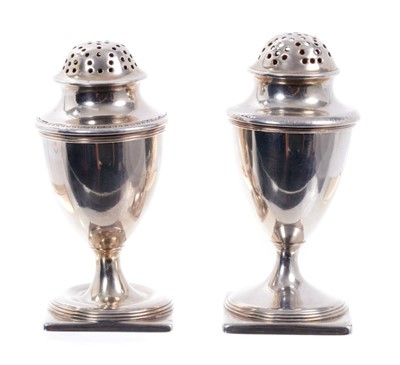 Lot 319 - Two George III silver pepperettes