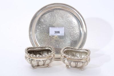 Lot 306 - Victorian silver card tray of circular form, with foliate engraved decoration and bead border (London 1857) Henry Wilkinson & Co. Together with a pair of Edwardian silver salts of compressed balust...
