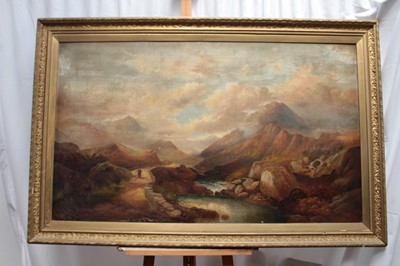 Lot 1023 - English School mid 19th Century, oil on canvas – An extensive view of Llanberis Pass Wales with figures on a track by the river, in gilt frame, 74cm x 125cm