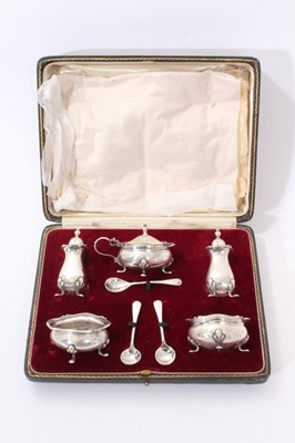 Lot 307 - Early 20th century five piece condiment set, comprising pair of salts of compressed baluster form with flared borders, matching pair peppers and a mustard pot (Birmingham 1919) Together with three...