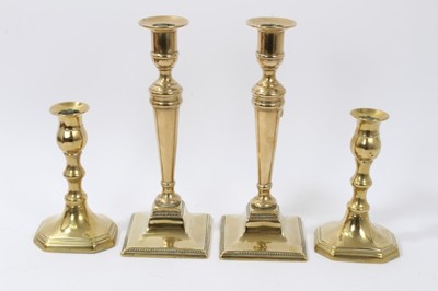 Lot 755 - Pair of George III brass candlesticks