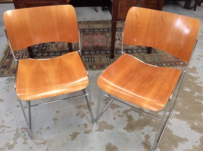 Lot 1262 - Set of eight Howe 40/4 plywood stacking chairs by David Rowland, bent ply back and seat on metal rod understructure, maker's labels to underside