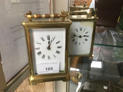 Lot 105 - Two brass cased carriage clocks with white enamel dials and Roman numerals, both with keys