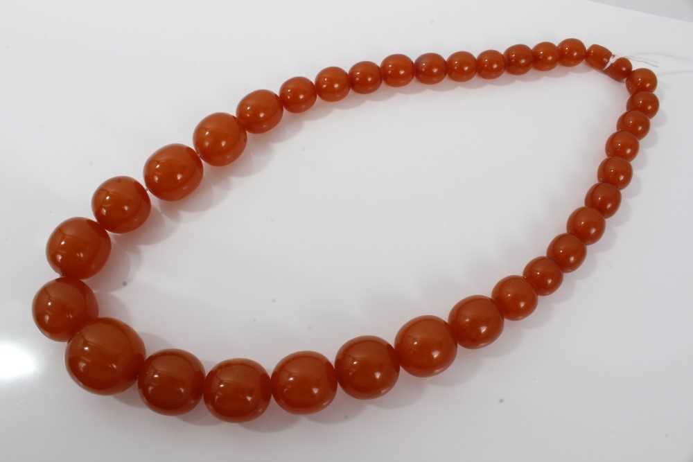 Buy Genuine Amber - Baby Unisex Teething Necklace - 100% Natural Baltic  Amber Polished Amber Beads - Natural Analgesic - Knotted Between Beads -  With Plastic Screw Clasp (12.6 inches, Pink - Cognac) Online at  desertcartINDIA