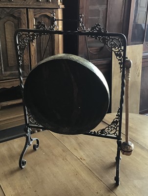 Lot 104 - Old brass gong in wrought iron stand