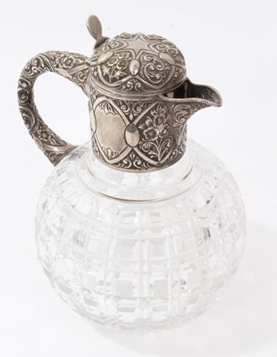 Lot 323 - Late Victorian Silver and cut glass claret jug