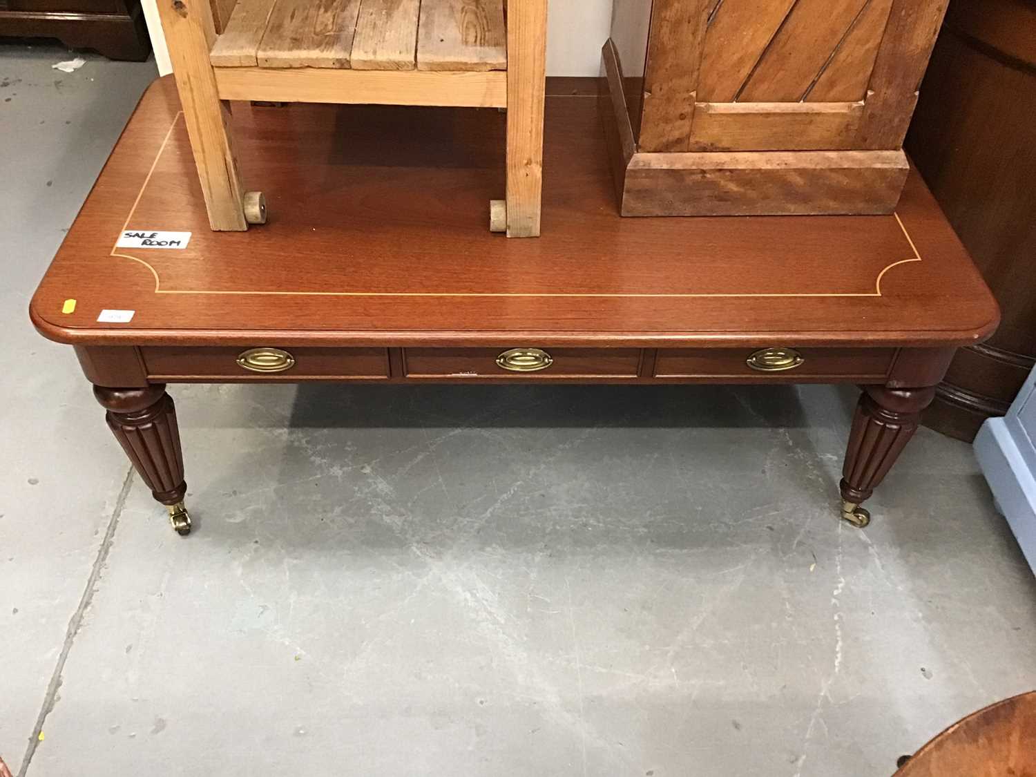 Lot 979 - Reproduction mahogany  coffee table with three drawers on turned legs
