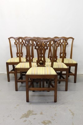 Lot 1276 - Set six George III country oak dining chairs with pierced splat backs, drop in seats with yellow striped upholstery on chamfered legs joined by stretchers