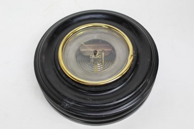 Lot 331 - Aneroid wall barometer in ebonised wood case