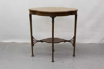 Lot 1201 - Edwardian inlaid mahogany two tier occasional table with carved capitals, taper legs on splayed feet 70cm wide.