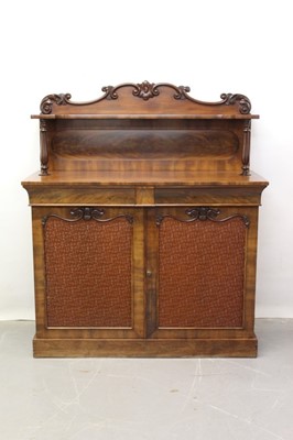 Lot 1294 - Good quality Victorian mahogany chiffonier with scroll carved ledge back, two frieze drawers and two doors below with original moulded tinted glass and foil backed panels on platform base 116 cm w...