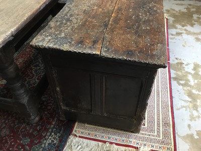 Lot 1300 - Large 17th century carved oak coffer with tulip decoration