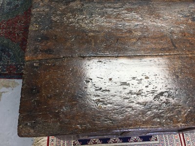 Lot 1300 - Large 17th century carved oak coffer with tulip decoration