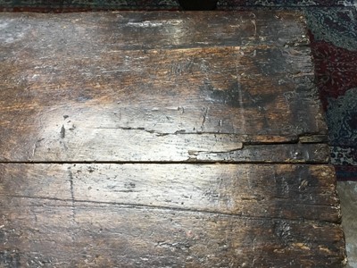 Lot 1300 - Large 17th century carved oak coffer with tulip decoration