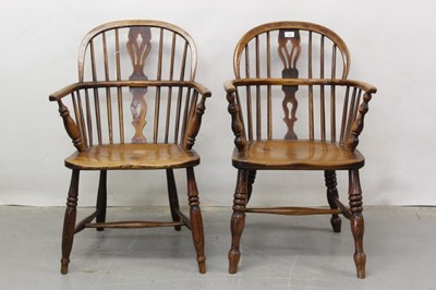 Lot 1305 - Pair 19th century ash and elm country Windsor stick back elbow chairs with solid seats on turned legs.