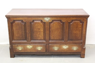 Lot 1304 - 18th century oak panelled mule chest with turned pilasters ,two drawers on bracket feet. 143cm wide, 54cm deep, 85 cm high.