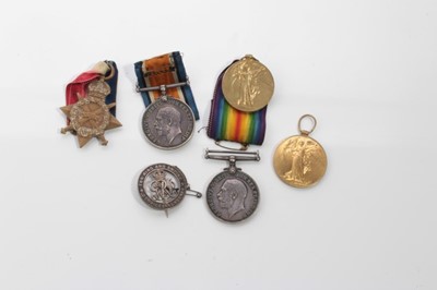 Lot 636 - First World War 1914-15 Star trio, together with a First World War pair and a silver War badge