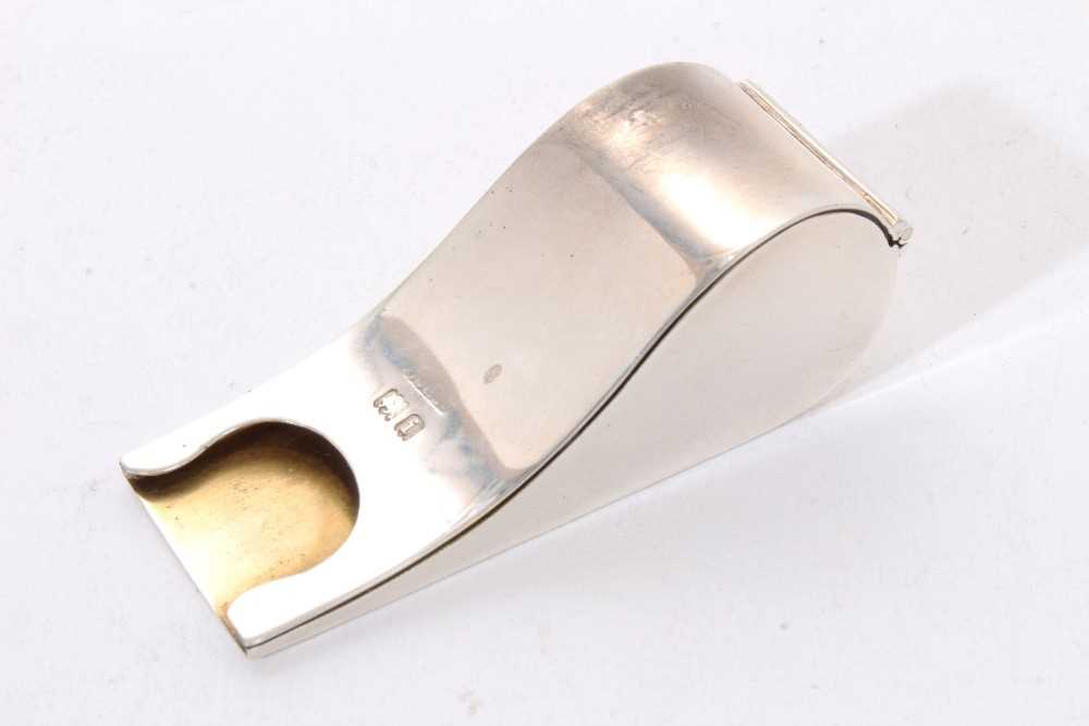 Lot 338 - Edwardian silver stamp reel holder in the form of a whistle.