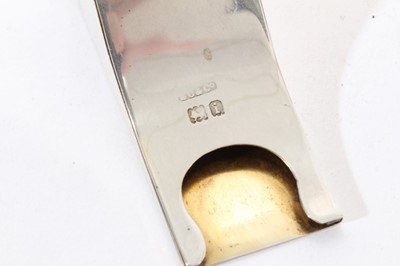 Lot 338 - Edwardian silver stamp reel holder in the form of a whistle.